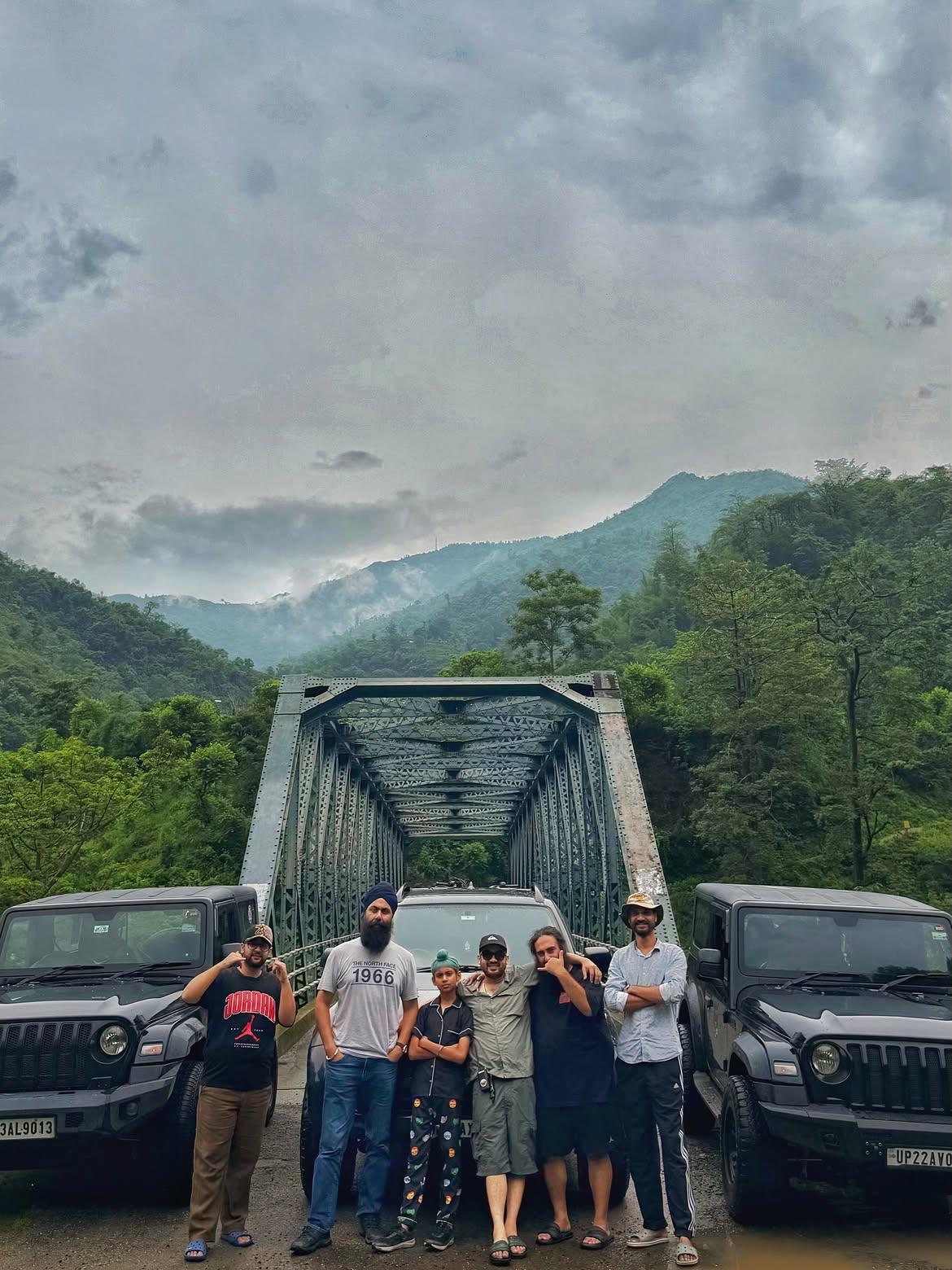 The UK 4x4 Crew convoy on a Himalayan bridge crossing